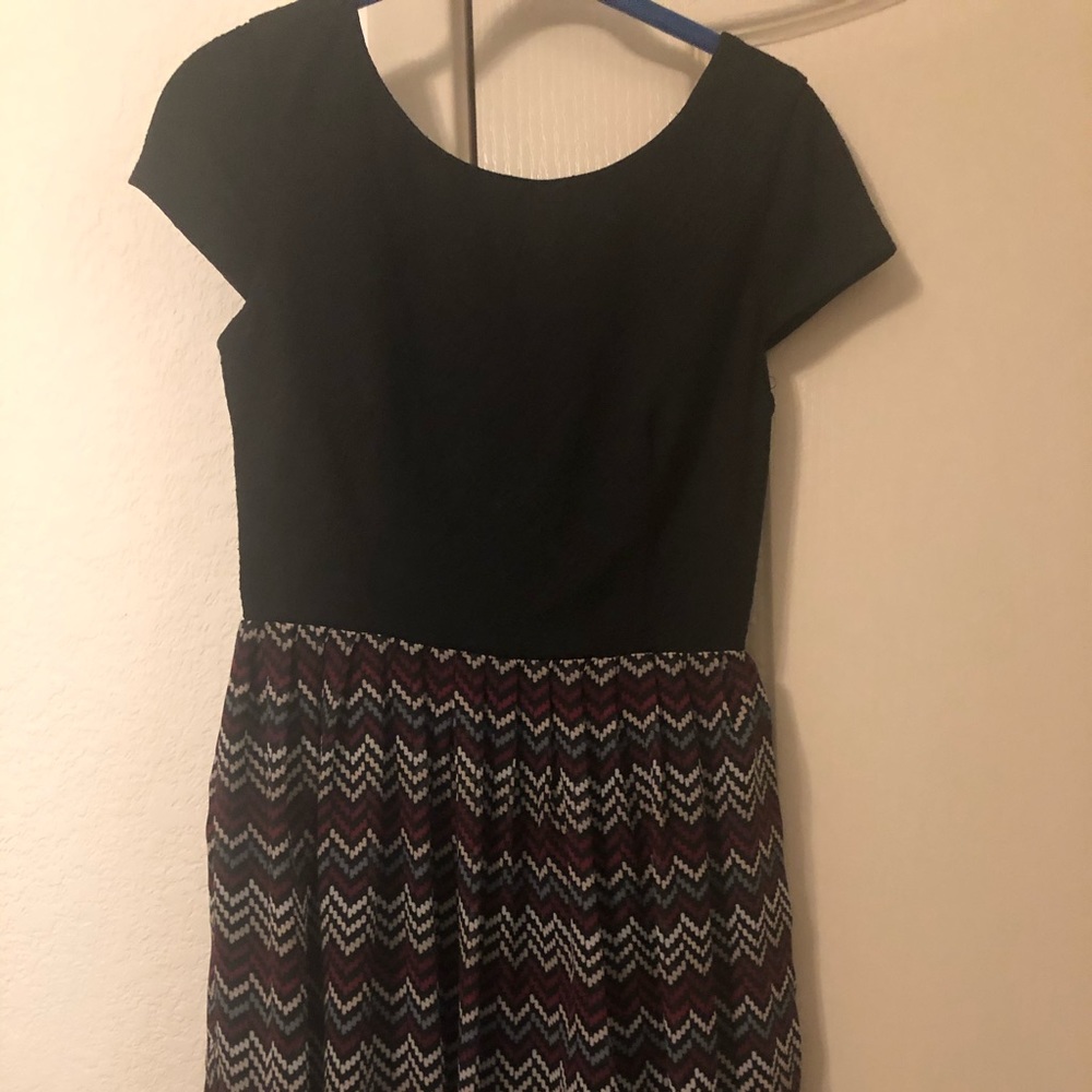 Black dress with purple, blue, and white chevron